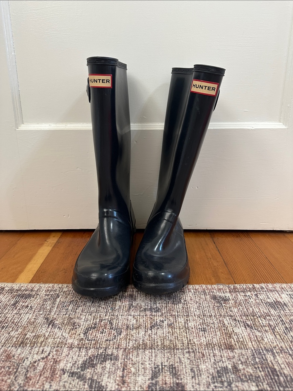 Hunter Black Tall Women's Rain Boots with Red Logo Badge